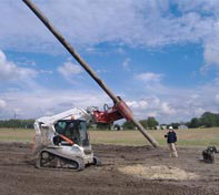 The Heavy Duty Pole Setter is used with Electric Cooperatives